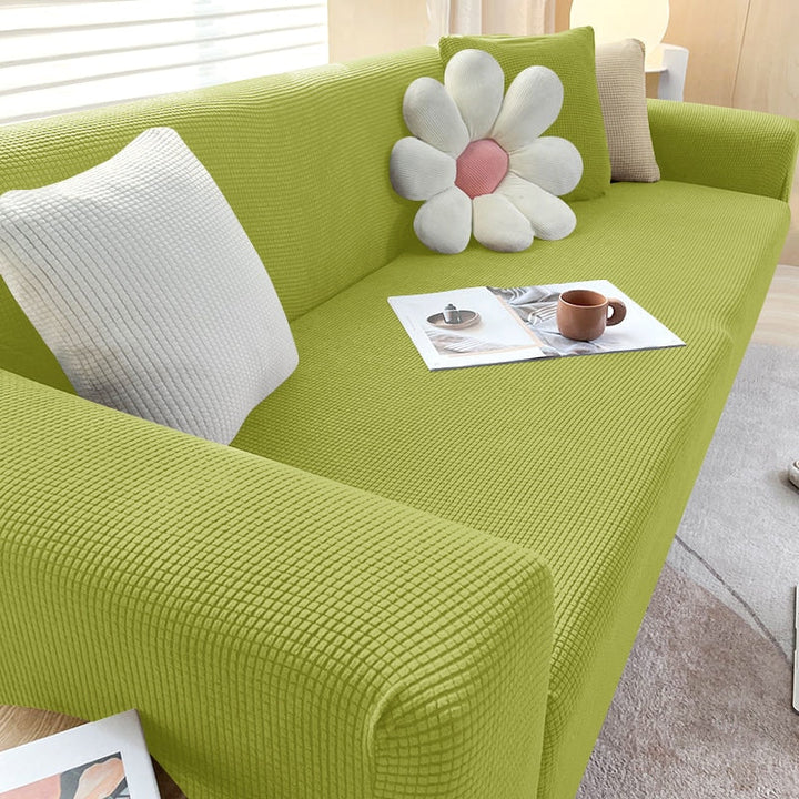 Beige Sofahusse aus elastischem Stretchmaterial, perfekter Sitz, Schutz vor Flecken, Schmutz und Tierhaaren.