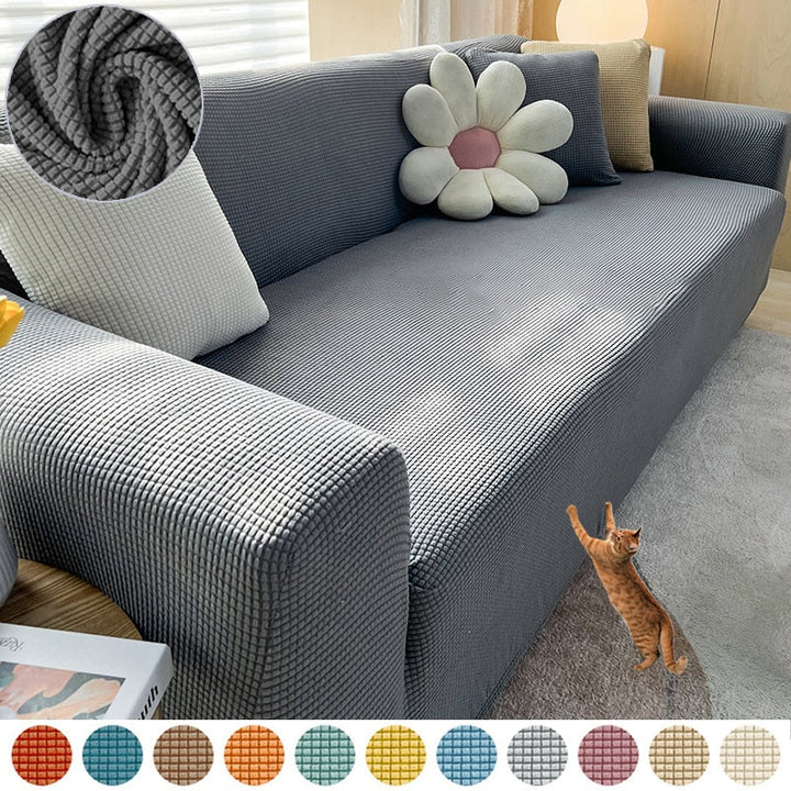 Beige Sofahusse aus elastischem Stretchmaterial, perfekter Sitz, Schutz vor Flecken, Schmutz und Tierhaaren.
