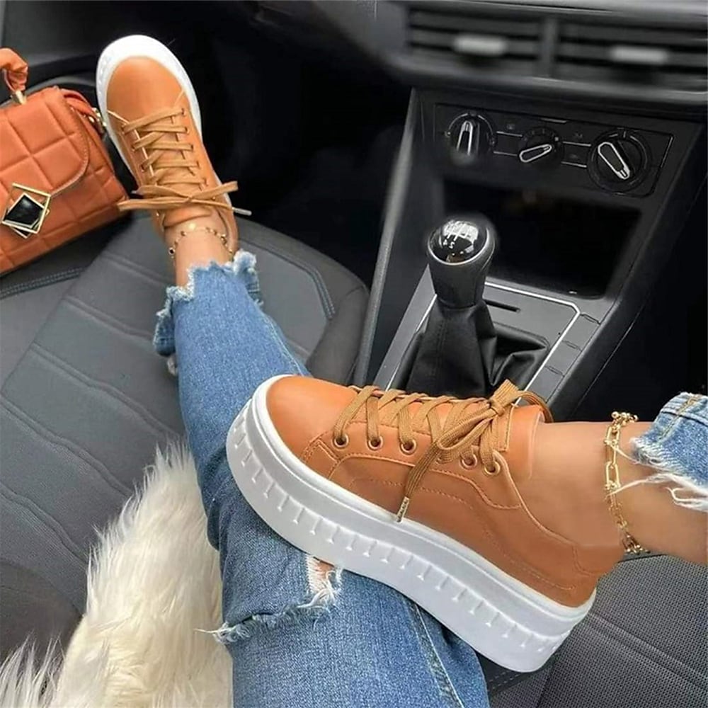 "Bequeme Damensneaker mit Plateau-Sohle, Schnürdesign in Weiß, moderne Optik für stilbewusste Frauen."