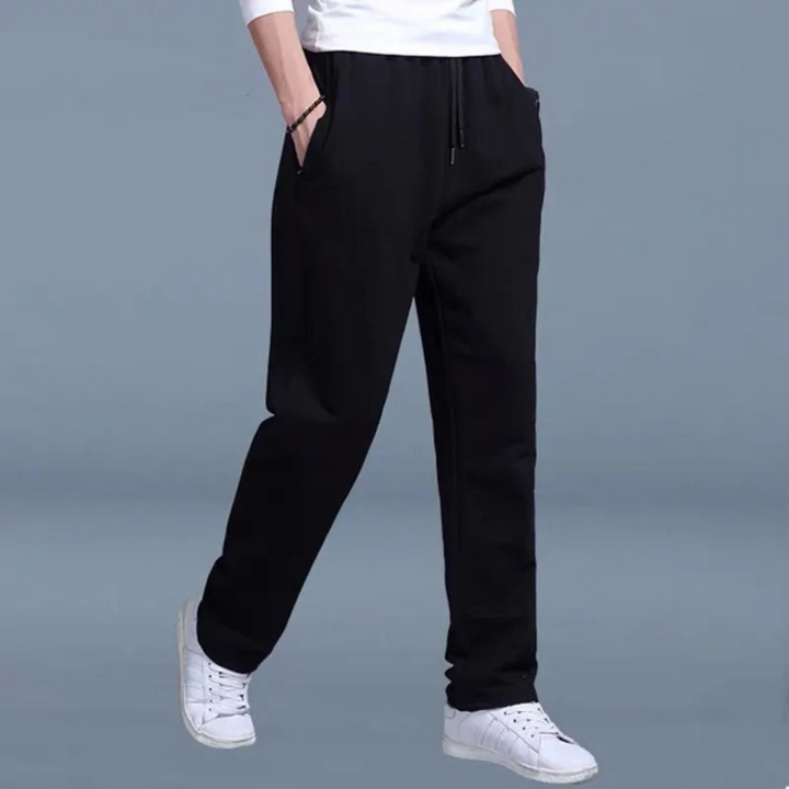 "Bequeme Herren Jogginghose: Sportlicher Schnitt, weicher Stoff, elastischer Bund, ideal für Sport und Freizeit."