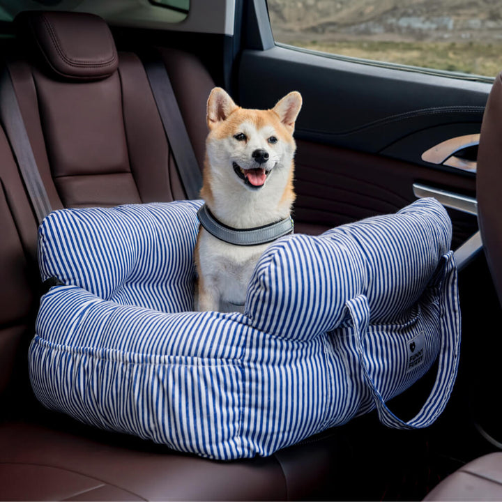 "Bequemes, tragbares Hundesitzbett im Auto, geeignet für Reisen, mit weicher Polsterung und verstellbaren Gurten."