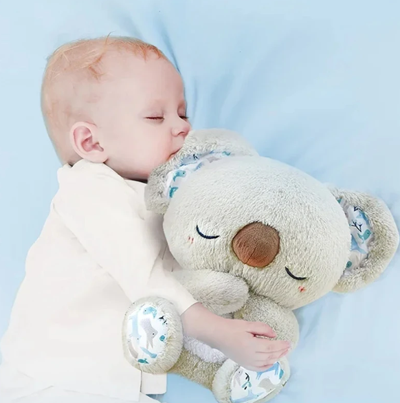 "Beruhigendes Koala-Atemspielzeug für Kinder, simulierende Atembewegung, sanfte Farben und integriertes Nachtlicht."