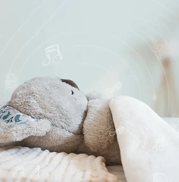 "Beruhigendes Koala-Atemspielzeug für Kinder, simulierende Atembewegung, sanfte Farben und integriertes Nachtlicht."