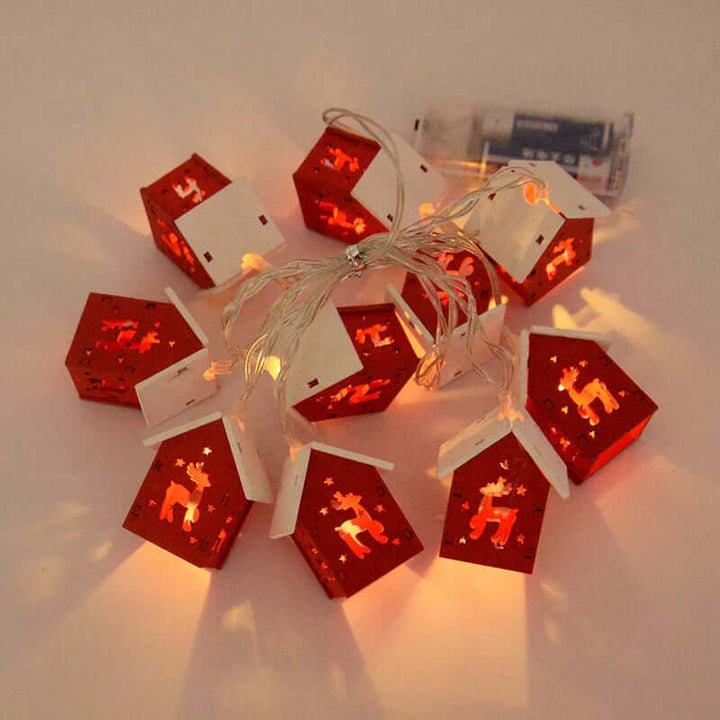 Hängende Holz-Weihnachtshäuser mit LED