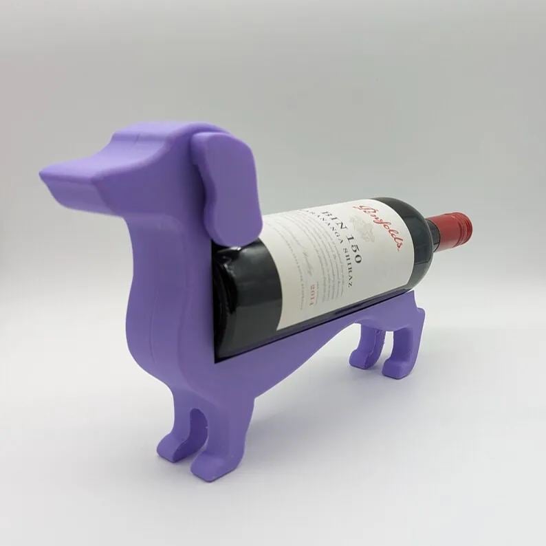 "Dackel Weinflaschenhalter: Stilvoller Dackelstil in verschiedenen Farben, elegant für Ihre Weinpräsentation"