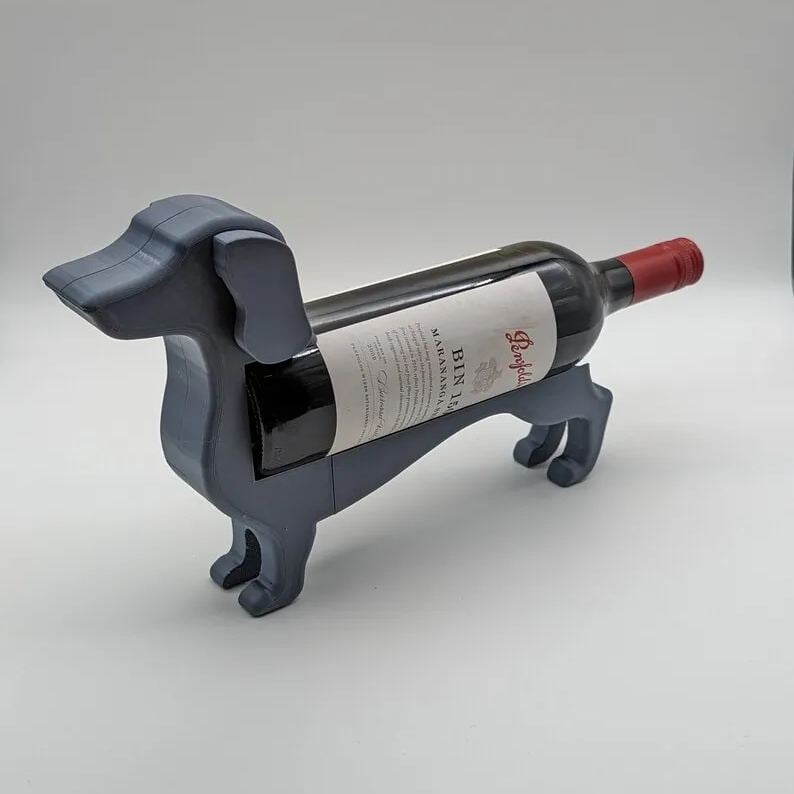 "Dackel Weinflaschenhalter: Stilvoller Dackelstil in verschiedenen Farben, elegant für Ihre Weinpräsentation"