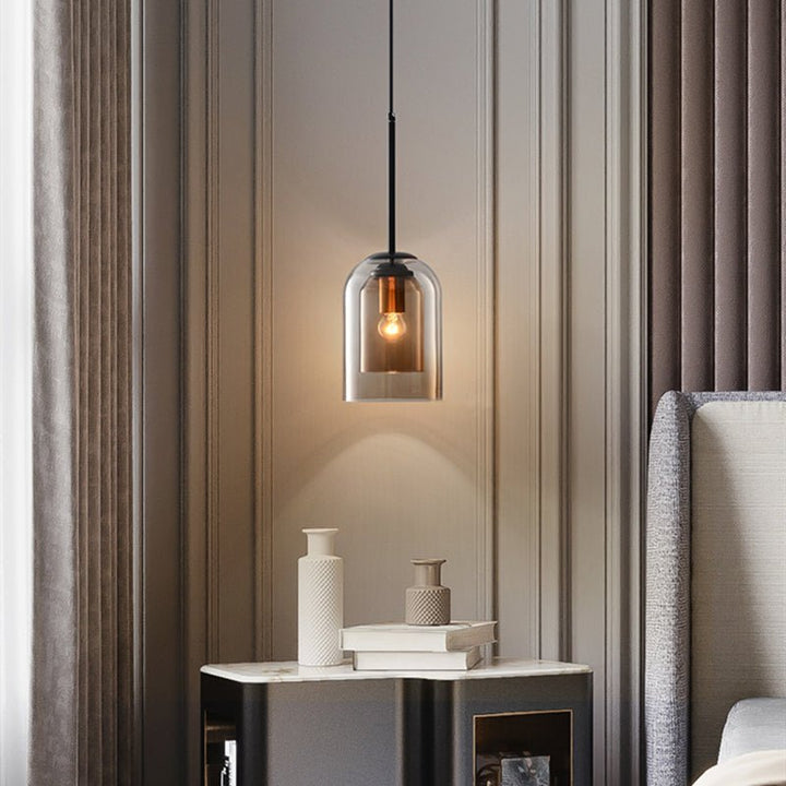 "Doppelglas-Pendelleuchte aus Rauchglas mit rostigem Finish, elegantes Design für moderne Inneneinrichtung."