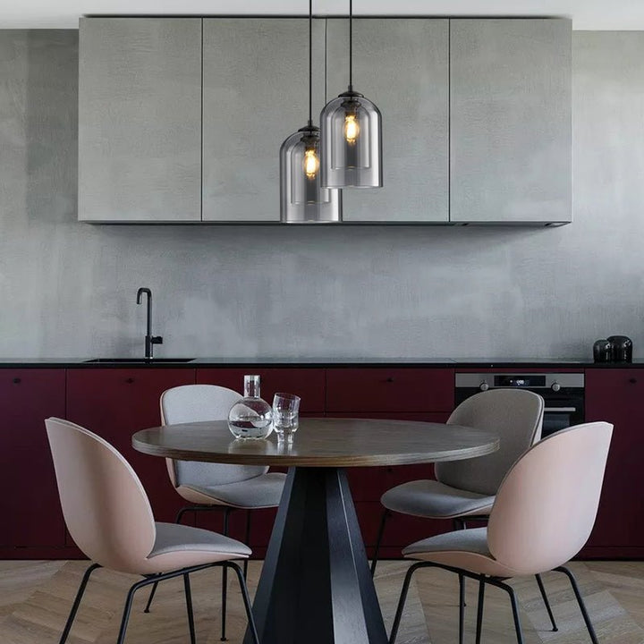 "Doppelglas-Pendelleuchte aus Rauchglas mit rostigem Finish, elegantes Design für moderne Inneneinrichtung."