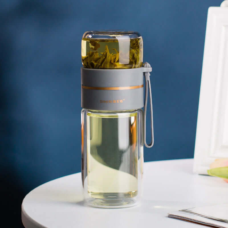 Bouteille à thé en verre à double paroi avec passoire en acier inoxydable