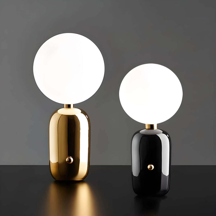 Elegante Tischleuchte mit Glasfuß