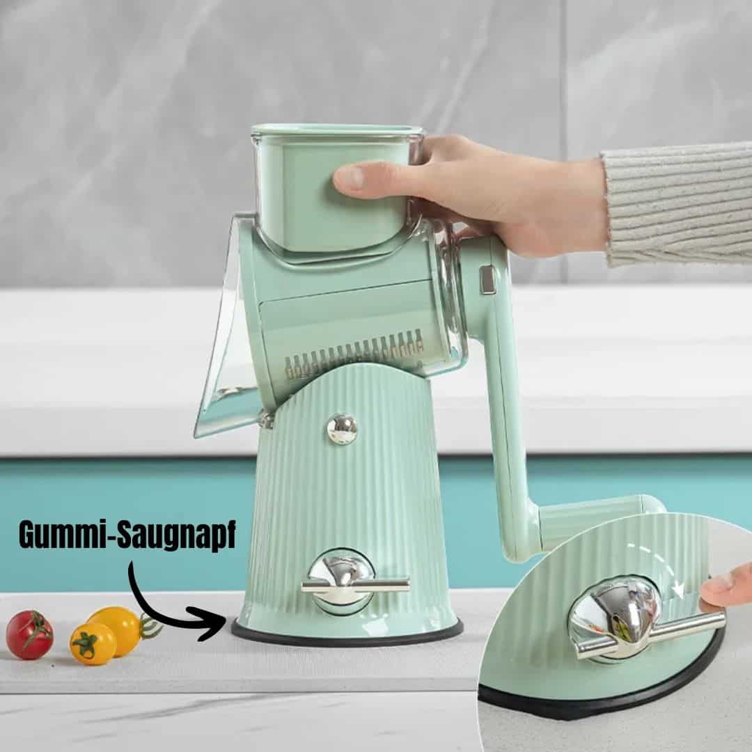 "Effiziente kompakte Küchenreibe in Grün, robustes Design für sicheres Schneiden und Reiben von Gemüse und Obst."