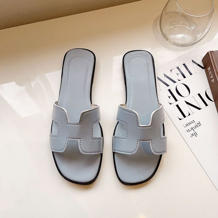 "Elegante H-Profil Leder Sandalen in lebhaften Farben, bequem und modisch, aus hochwertigem Leder gefertigt."