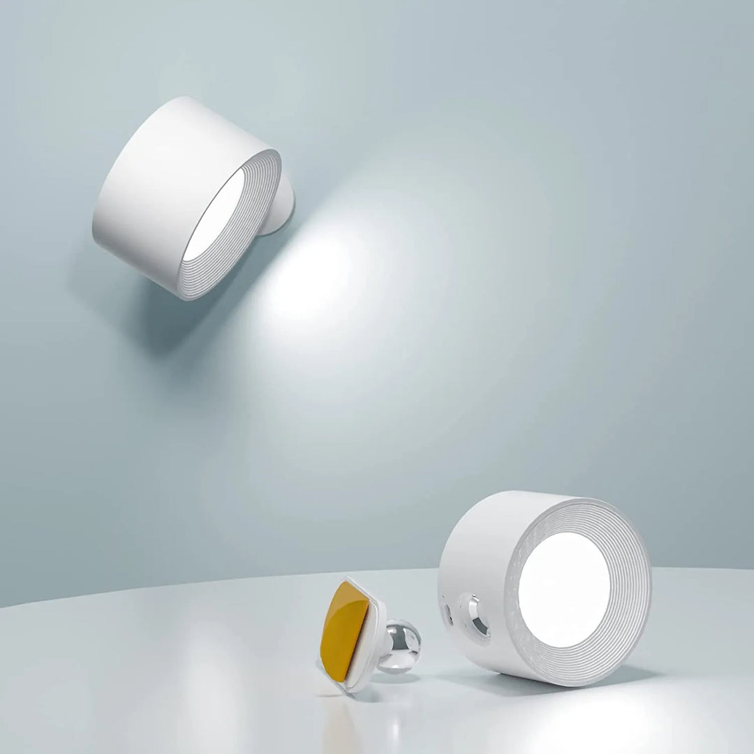 "Elegante kabellose Wandleuchte, schwarz, seitliche Ansicht, dimmbare LED mit 360° drehbarem Licht, flexibel positionierbar."