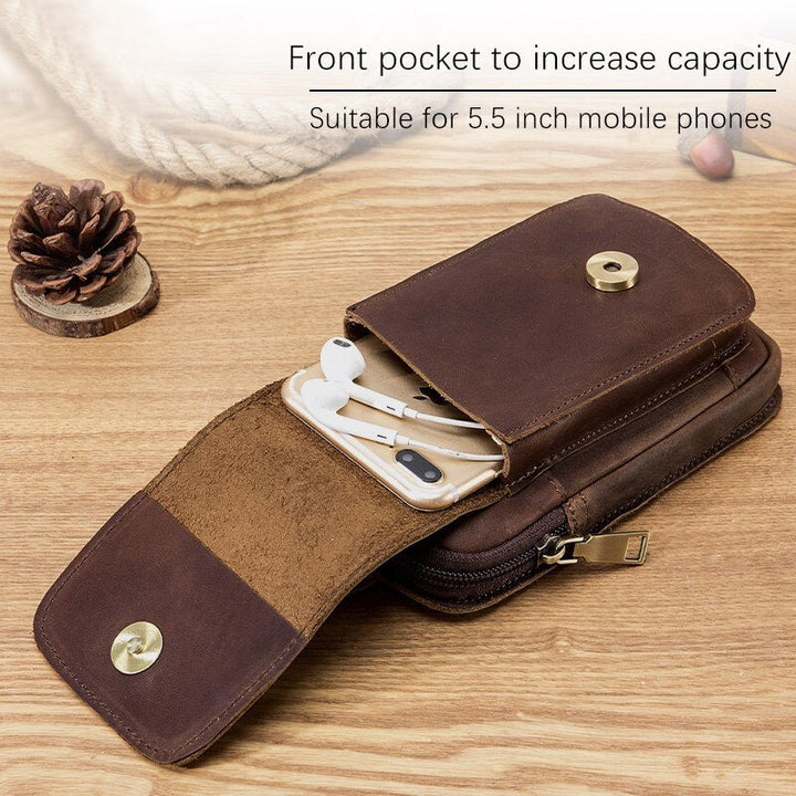 "Elegante Ledergürteltasche, passt für 7-Zoll Smartphones, aus robustem braunem Rindsleder mit Gürtelbefestigung."