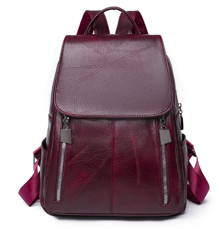 "Eleganter diebstahlsicherer Damen-Lederrucksack, Vorderansicht, stilvolles Design in Braun, Dunkelrot oder Schwarz."