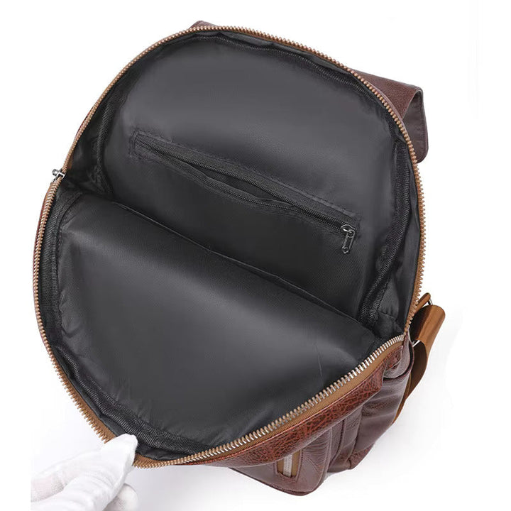 "Eleganter diebstahlsicherer Damen-Lederrucksack, Vorderansicht, stilvolles Design in Braun, Dunkelrot oder Schwarz."