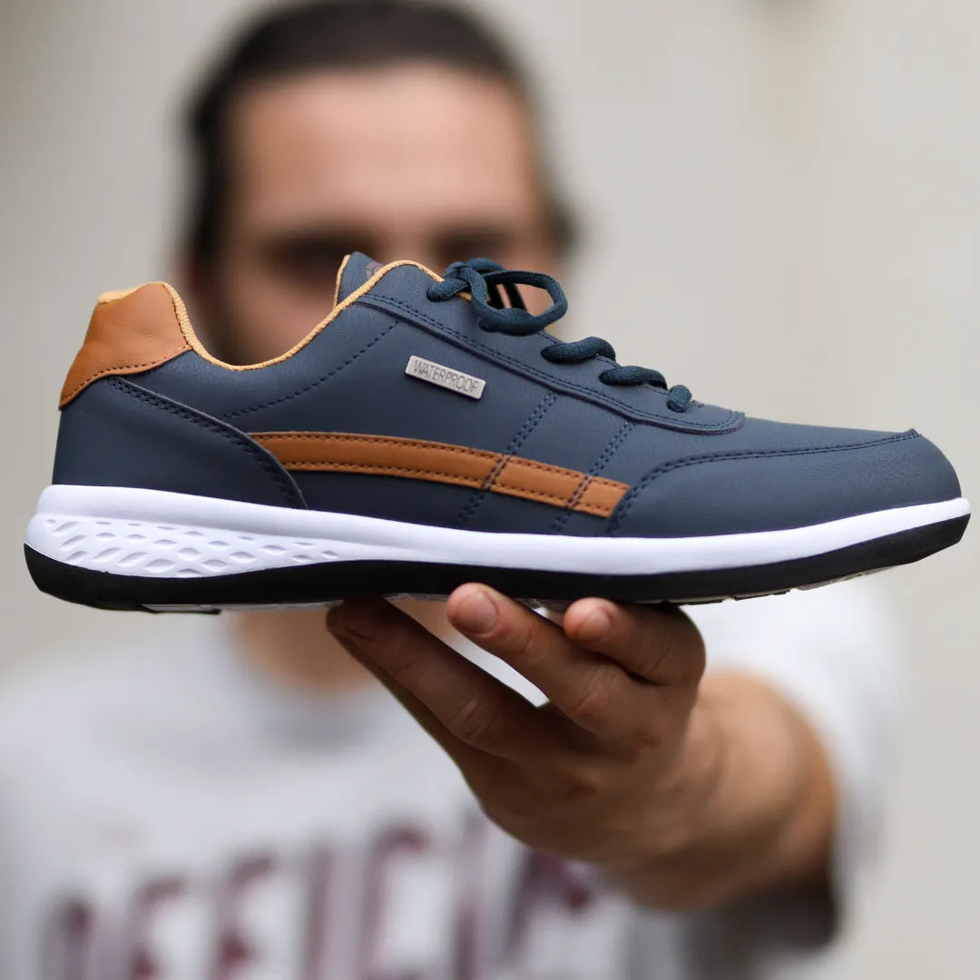 Ergonomische Komfortschuhe, blaue Akzente, atmungsaktives Material, breite Zehenpartie, ideal für Bewegung und Alltag.