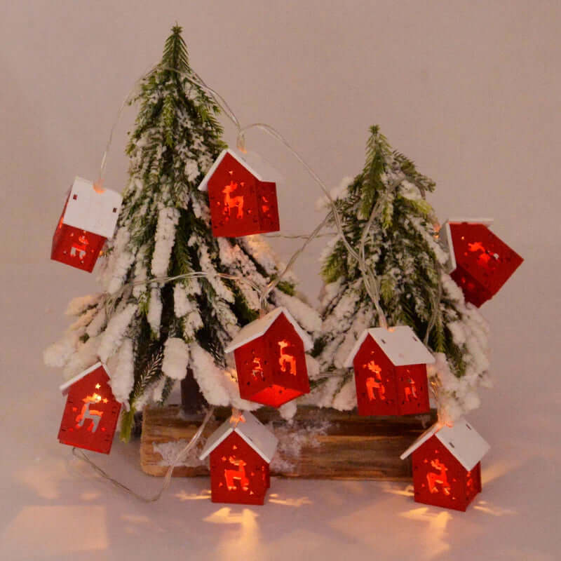 Hängende Holz-Weihnachtshäuser mit LED