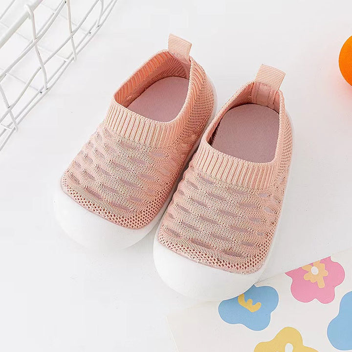 "Gestrickte Baby-Barefoot-Sockenschuhe, atmungsaktiv, rutschfest, in Grau. Flexibles, bequemes Design für kleine Füße."