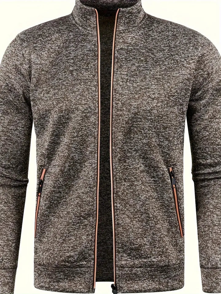Graue Herren Weste mit Reißverschluss vorne, ideal für Winter, bietet Stil und Komfort für vielseitige Aktivitäten.