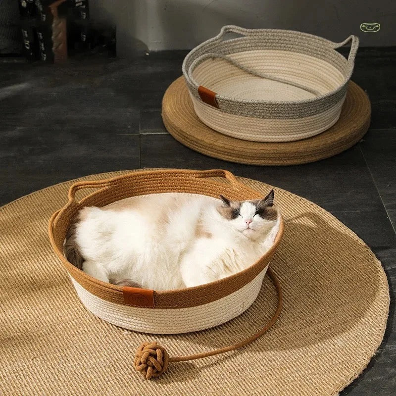 "Handgewebtes ergonomisches Katzenbett aus natürlichem Baumwollseil – stilvoller Schlafplatz, sicher, in Grau gezeigt."