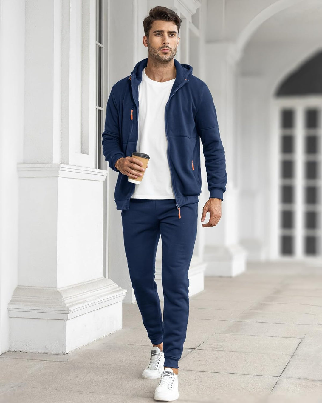 "Herren Slim-Fit-Trainingsanzug atmungsaktiv, dunkelblau, Vorderansicht, stilvoller Look, leichtes Material für Sport & Freiz