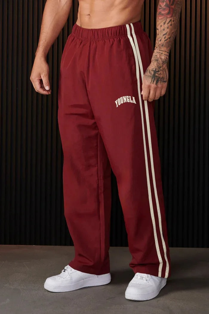 "Herren-Sporthose mit Patchwork-Design, doppelseitigen Streifen in Schwarz-Weiß, flexibel und komfortabel für Sport und Allta
