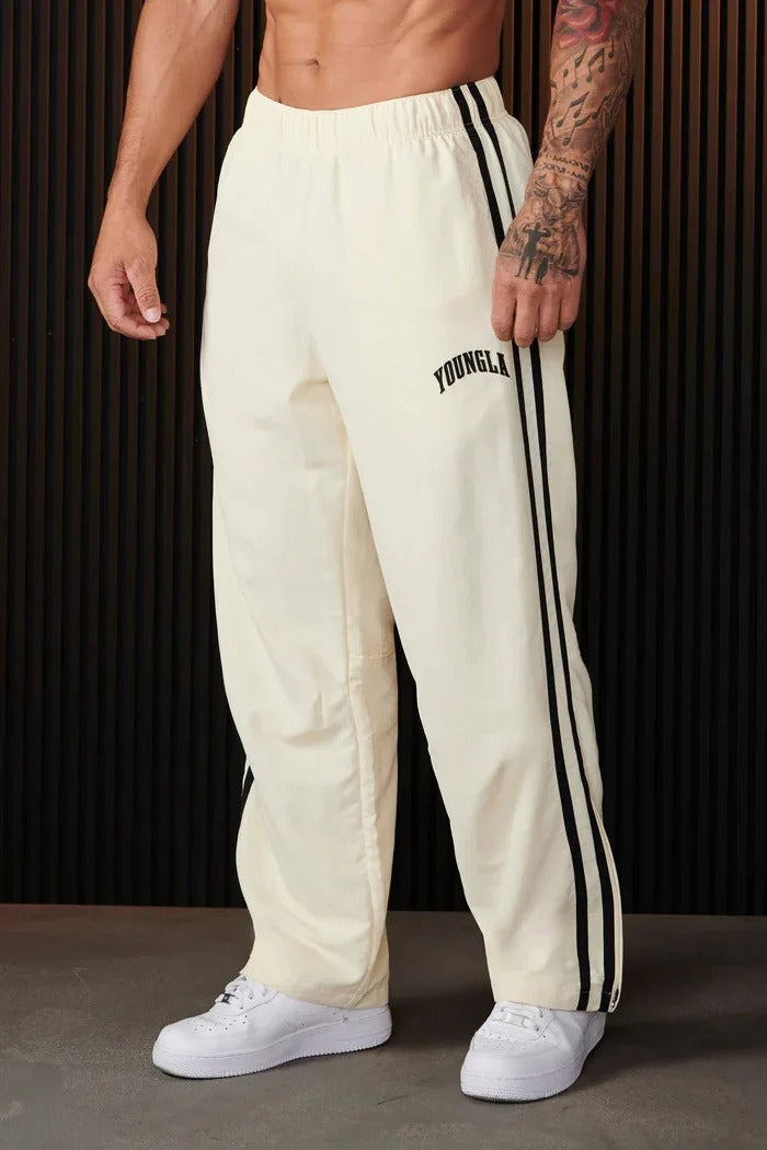 "Herren-Sporthose mit Patchwork-Design, doppelseitigen Streifen in Schwarz-Weiß, flexibel und komfortabel für Sport und Allta