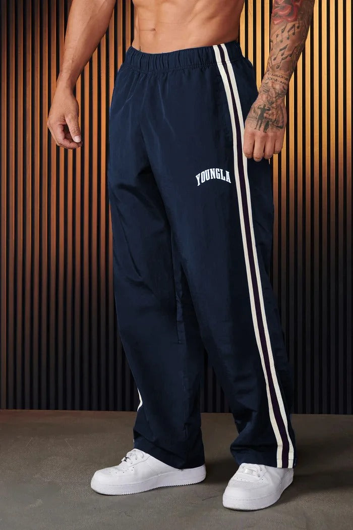 "Herren-Sporthose mit Patchwork-Design, doppelseitigen Streifen in Schwarz-Weiß, flexibel und komfortabel für Sport und Allta