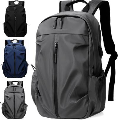 "Herren Wasserdichter Rucksack mit Anti-Diebstahl & USB, grau-schwarz, viele Fächer, ideal für Reisen & Laptop-Transport."