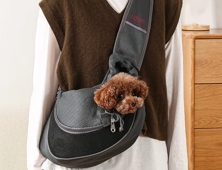 "Hunde-Tragetasche: graue, atmungsaktive Schultertasche mit gepolsterten Gurten für maximalen Komfort unterwegs."