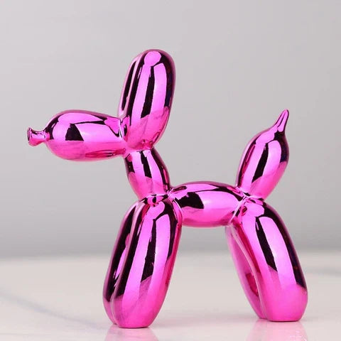"Kupferfarbene Ballonhund Skulptur, verspieltes Deko-Objekt mit glänzender Metalloberfläche, ideal für Wohnräume."