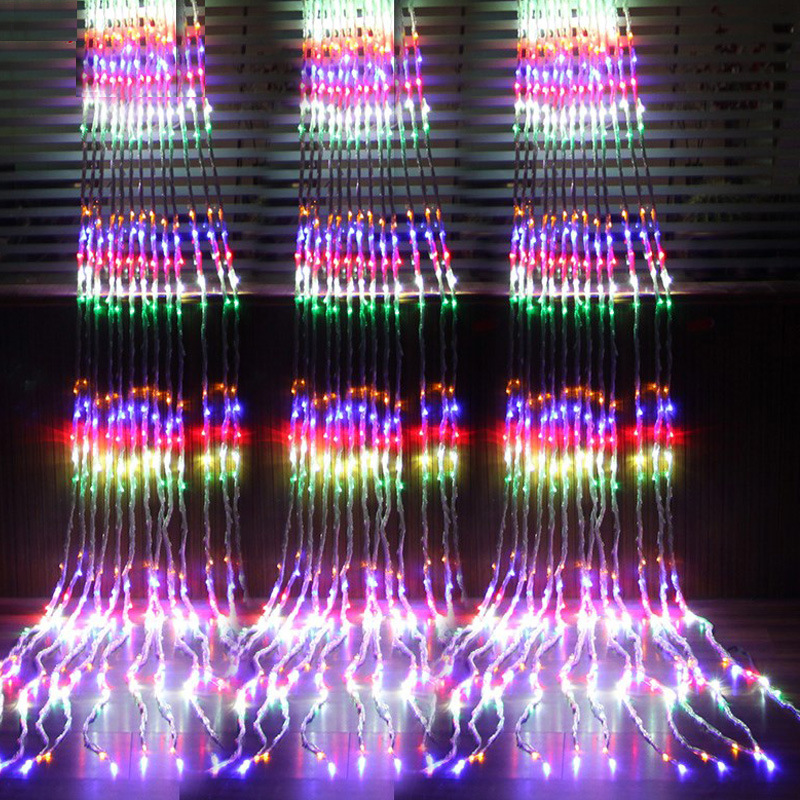 "LED Lichtervorhang mit Farbwechsel, für Fenster und Wände, schafft magisches Ambiente mit sanften farbigen Lichteffekten."