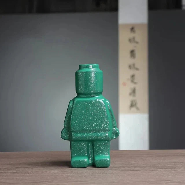 "Lego-Keramikvase im modernen Design, weiße Vase mit spielerischem Roboter-Look für stilvolle Wohn- und Bürodekoration."