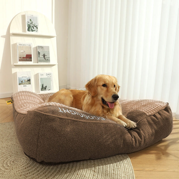 Luxuriöses, kratzfestes Hundebett mit orthopädischer Kopfstütze. Großes, bequemes Kissen für optimalen Hundekomfort.