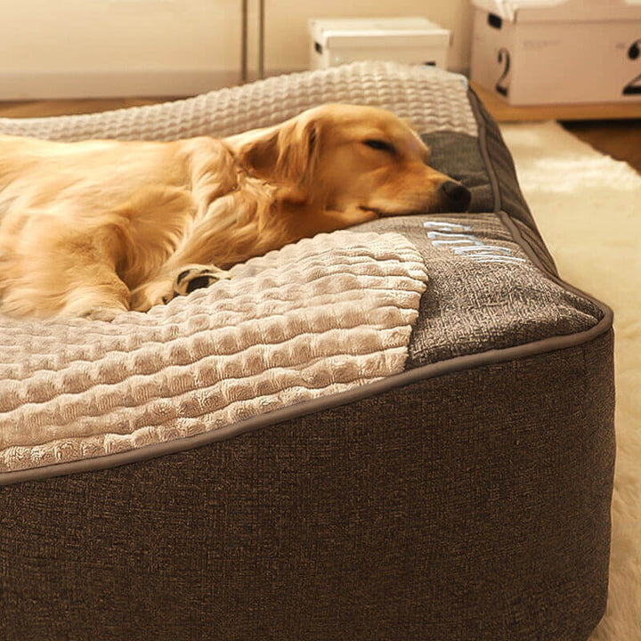 Luxuriöses, kratzfestes Hundebett mit orthopädischer Kopfstütze. Großes, bequemes Kissen für optimalen Hundekomfort.