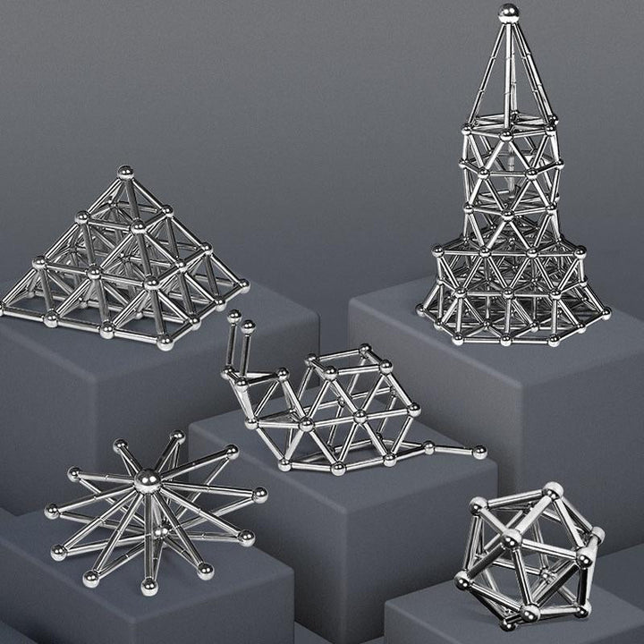 "Magnetisches Set aus silbernen Stäben und Kugeln, perfekt für kreative DIY-Projekte, auf hellem Hintergrund"