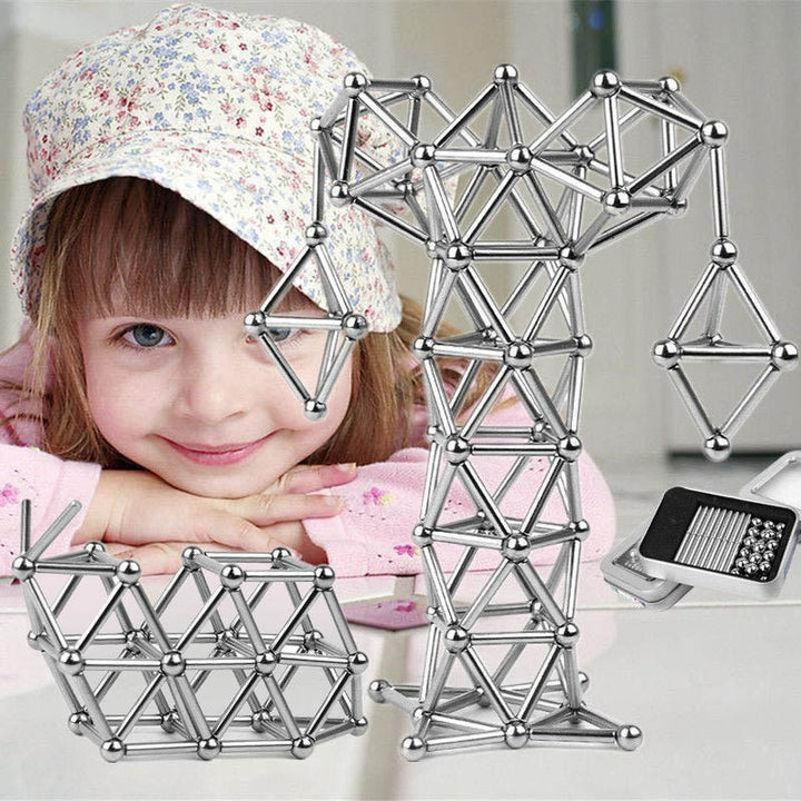 "Magnetisches Set aus silbernen Stäben und Kugeln, perfekt für kreative DIY-Projekte, auf hellem Hintergrund"