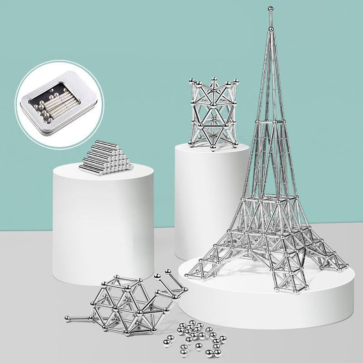 "Magnetisches Set aus silbernen Stäben und Kugeln, perfekt für kreative DIY-Projekte, auf hellem Hintergrund"