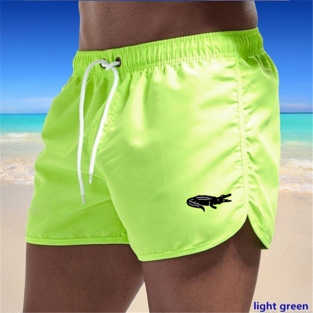 "Mehrfarbige, leichte Strand-Shorts mit elastischem Bund und modernem Druck, perfekt für Sommer und Sport."