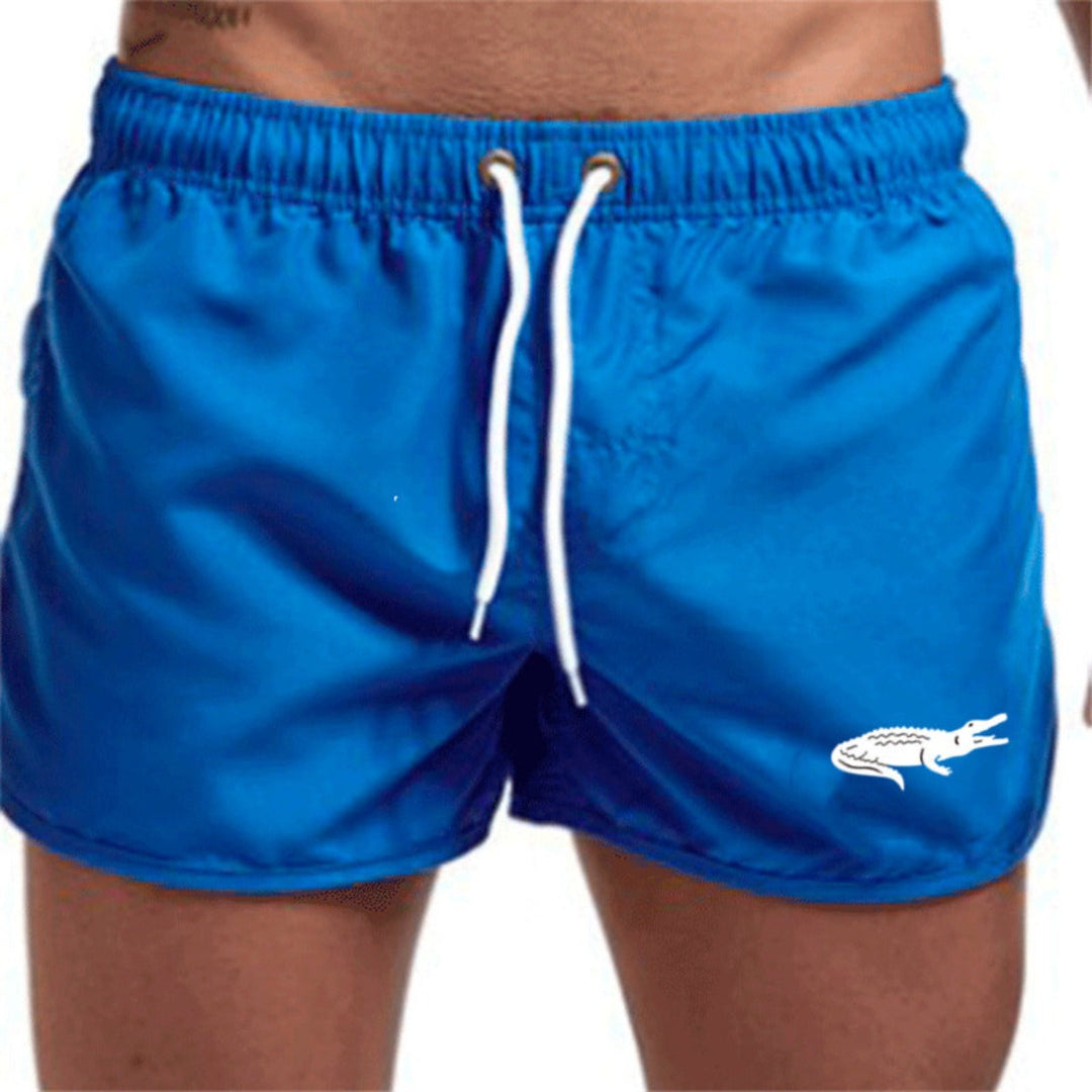 "Mehrfarbige, leichte Strand-Shorts mit elastischem Bund und modernem Druck, perfekt für Sommer und Sport."