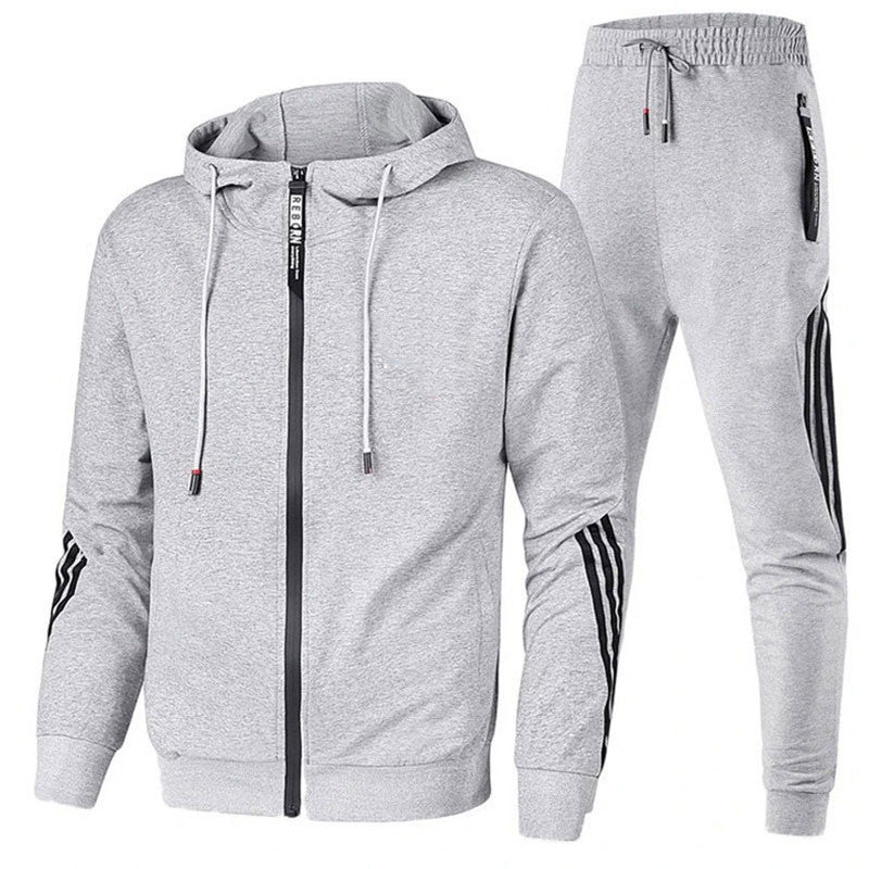 Moderner Herren Trainingsanzug, dunkel, aus hochwertigem Material für Komfort und Stil, ideal für Sport und Freizeit.