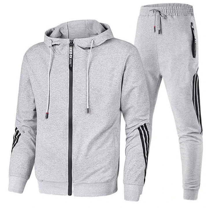 Moderner Herren Trainingsanzug, dunkel, aus hochwertigem Material für Komfort und Stil, ideal für Sport und Freizeit.
