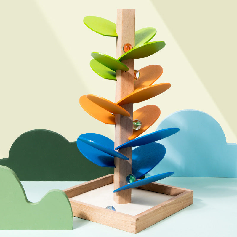 "Montessori Regenbogen Holzturm: Farbenfrohes Spielzeug mit rollenden Murmeln zur Förderung der motorischen Entwicklung."