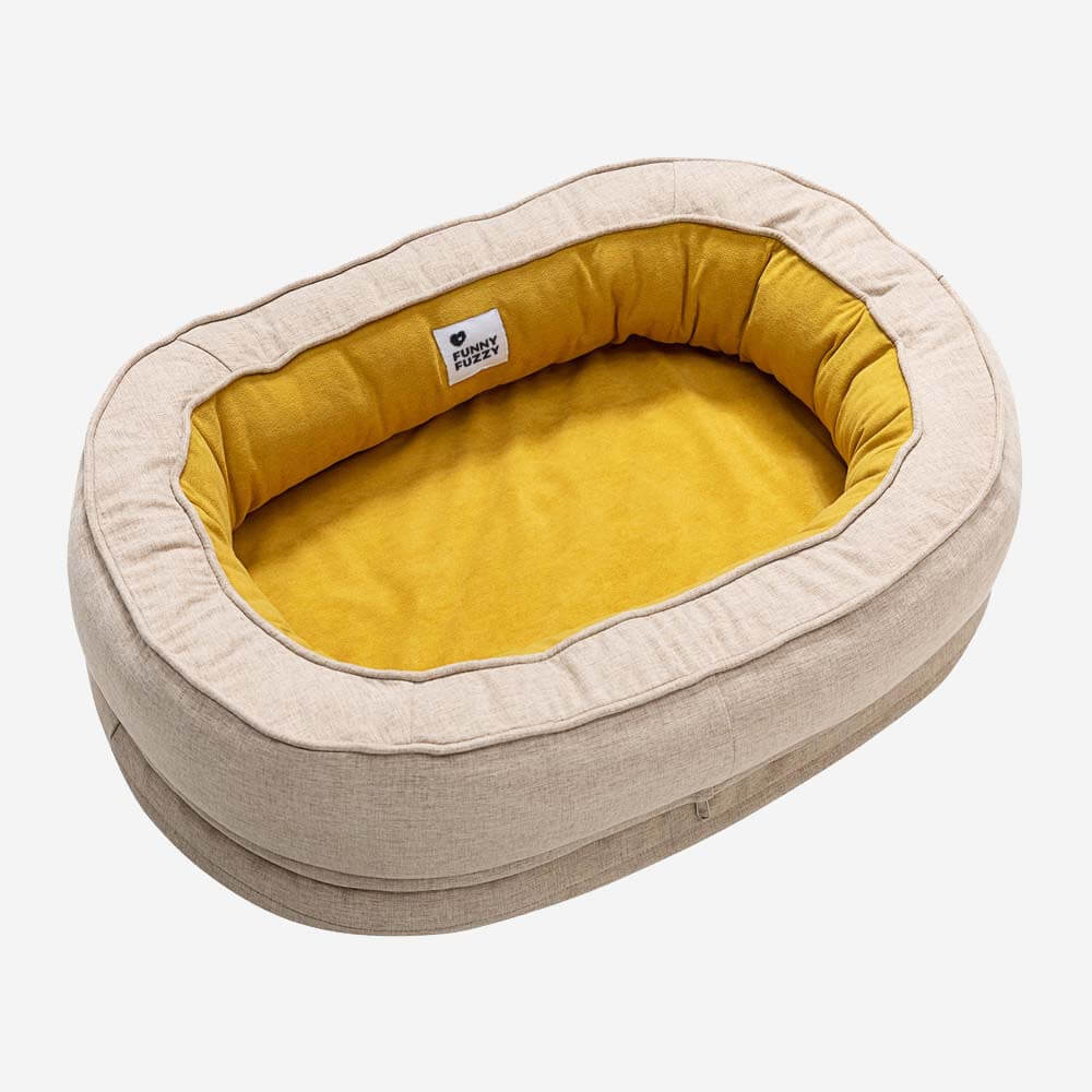 "Orthopädisches flauschiges Haustierbett in Donutform, beige, für Hunde, bietet Komfort und Unterstützung auf glatten Böden."