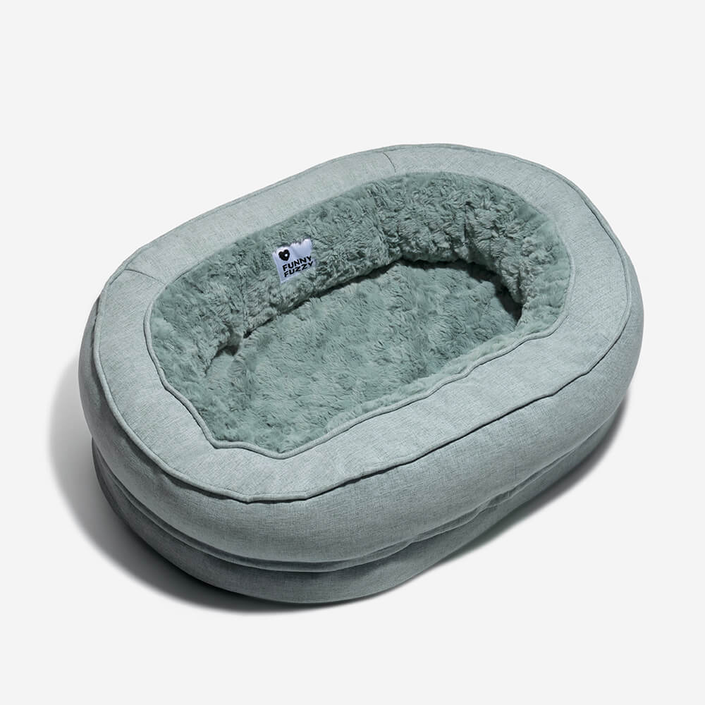 "Orthopädisches flauschiges Haustierbett in Donutform, beige, für Hunde, bietet Komfort und Unterstützung auf glatten Böden."