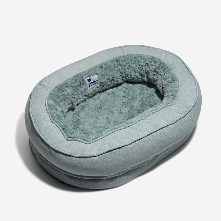 "Orthopädisches flauschiges Haustierbett in Donutform, beige, für Hunde, bietet Komfort und Unterstützung auf glatten Böden."