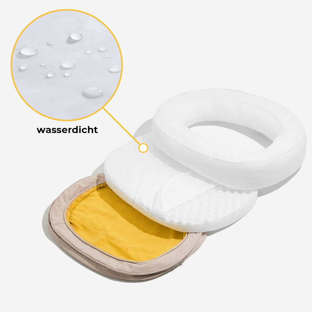 "Orthopädisches flauschiges Haustierbett in Donutform, beige, für Hunde, bietet Komfort und Unterstützung auf glatten Böden."