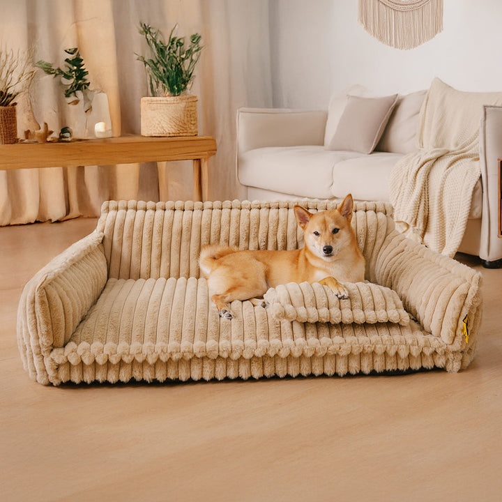 "Orthopädisches waschbares Hundebett aus Kunstfell mit Kissen und Armlehnen, ideal für Gelenkunterstützung, grau."
