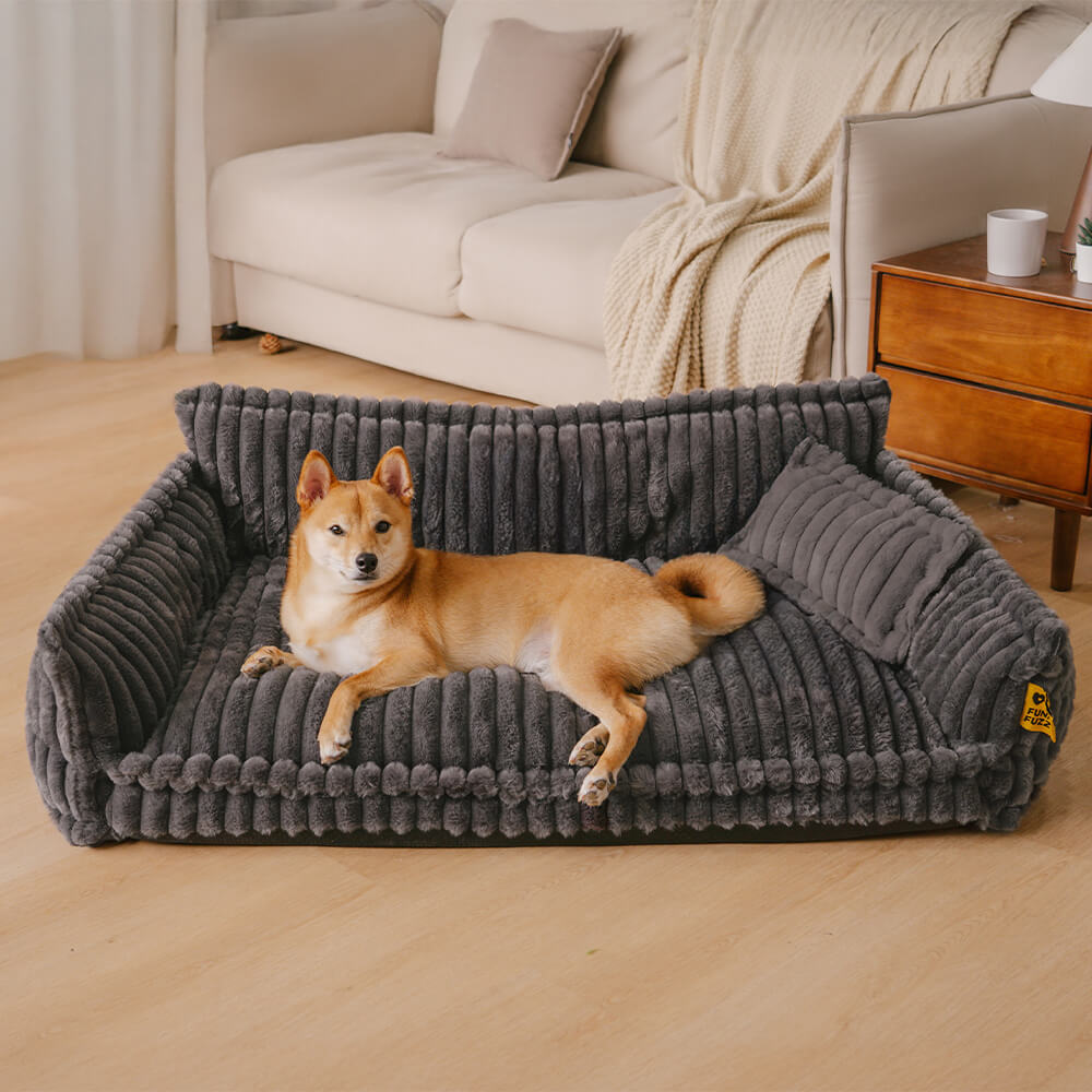 "Orthopädisches waschbares Hundebett aus Kunstfell mit Kissen und Armlehnen, ideal für Gelenkunterstützung, grau."
